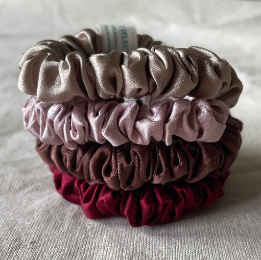 Four 100% 30 momme silk scrunchies in 1 cm wide with dusty pink,Bordeaux,chocolate brown,nude colors