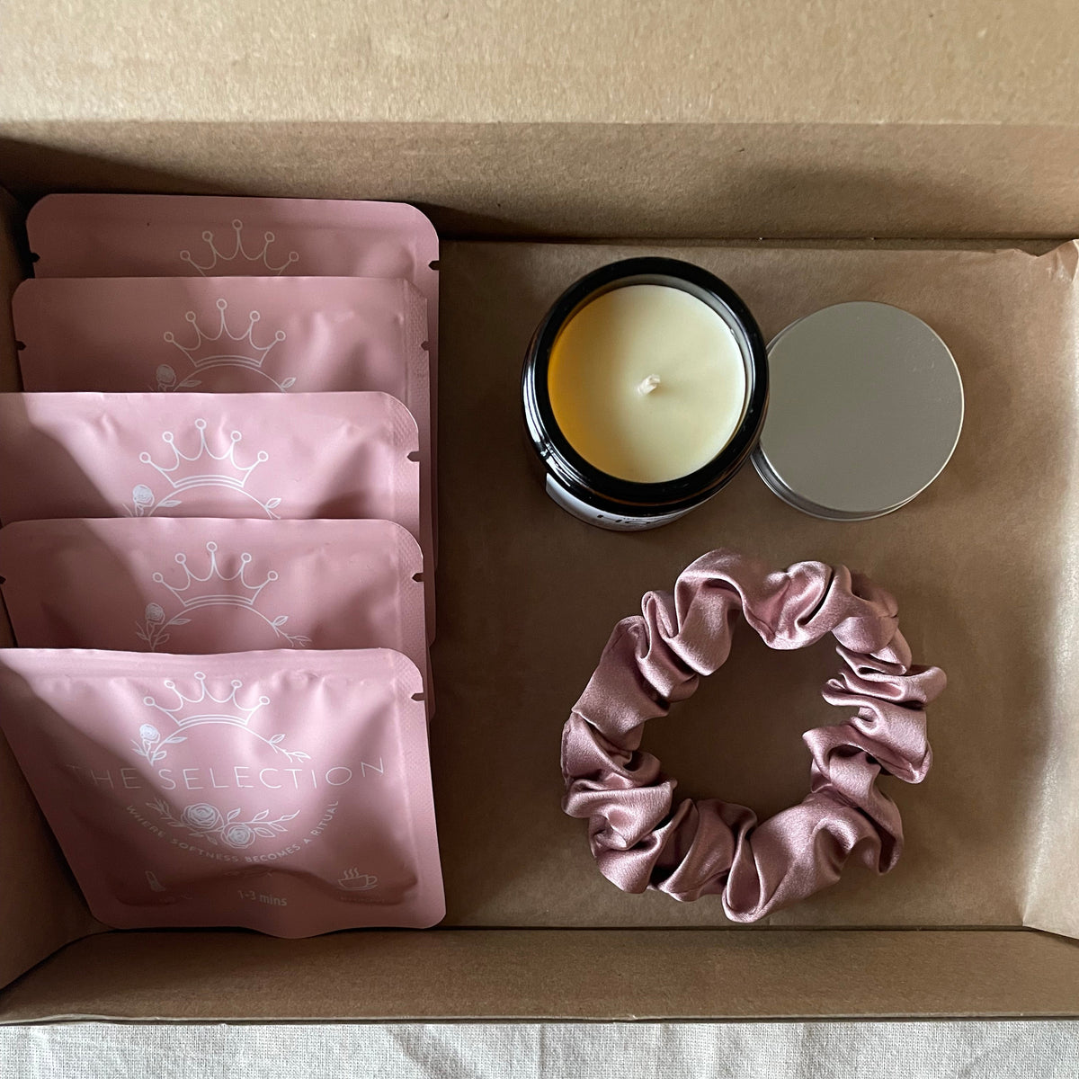 First Ritual includes 30 momme silk scrunchie candle and tea