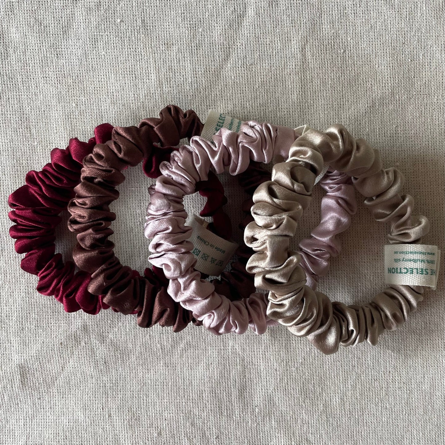 Four 100% 30 momme silk scrunchies in 1 cm wide with dusty pink,Bordeaux,chocolate brown,nude colors