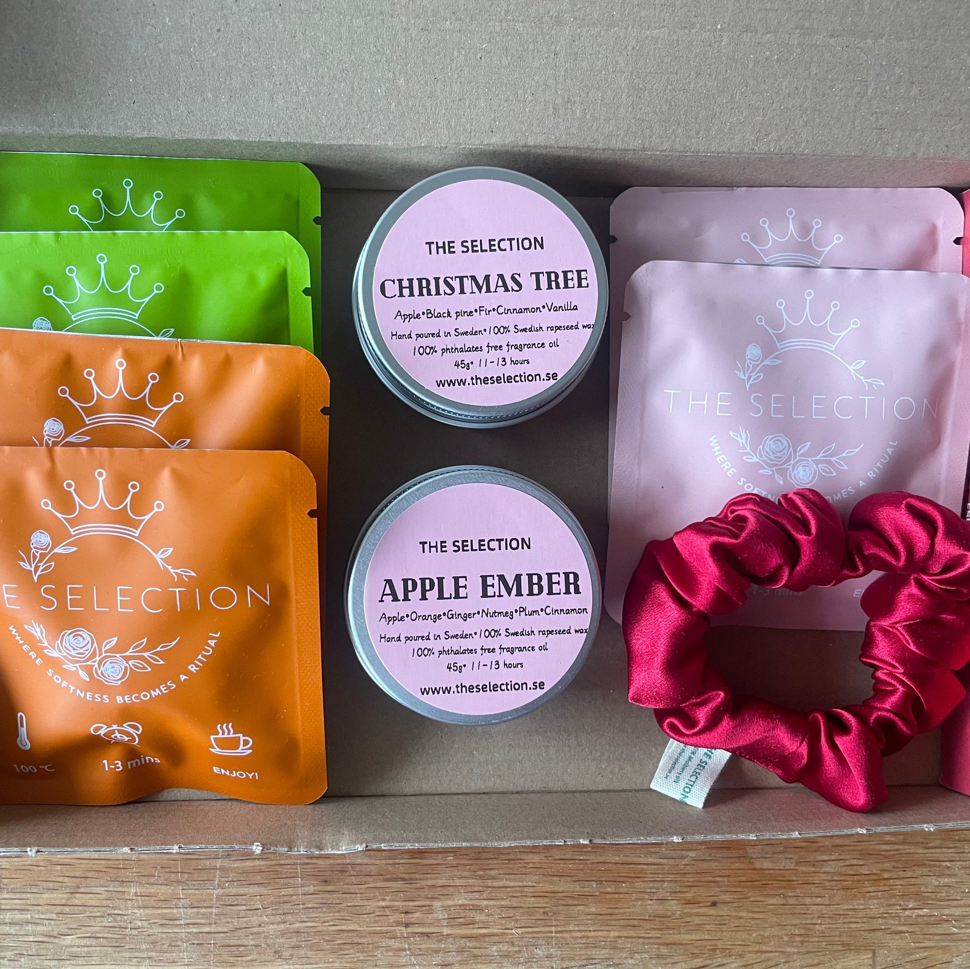6 herbal loose leaf tea plus 2 natural candles, and a 30 momme silk scrunchie gift box 