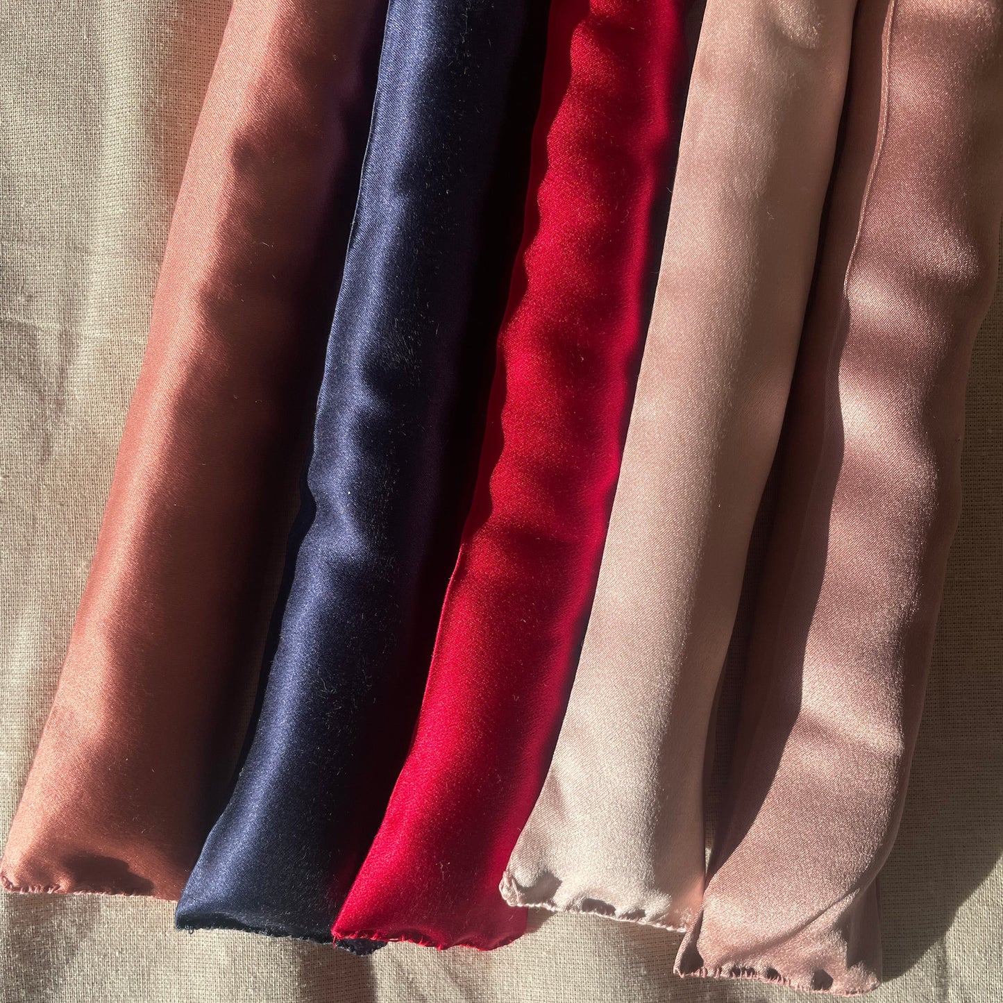 30 momme silk overnight curler with 100% cotton filling, 1 m long in cherry red color. Handmade in Sweden 