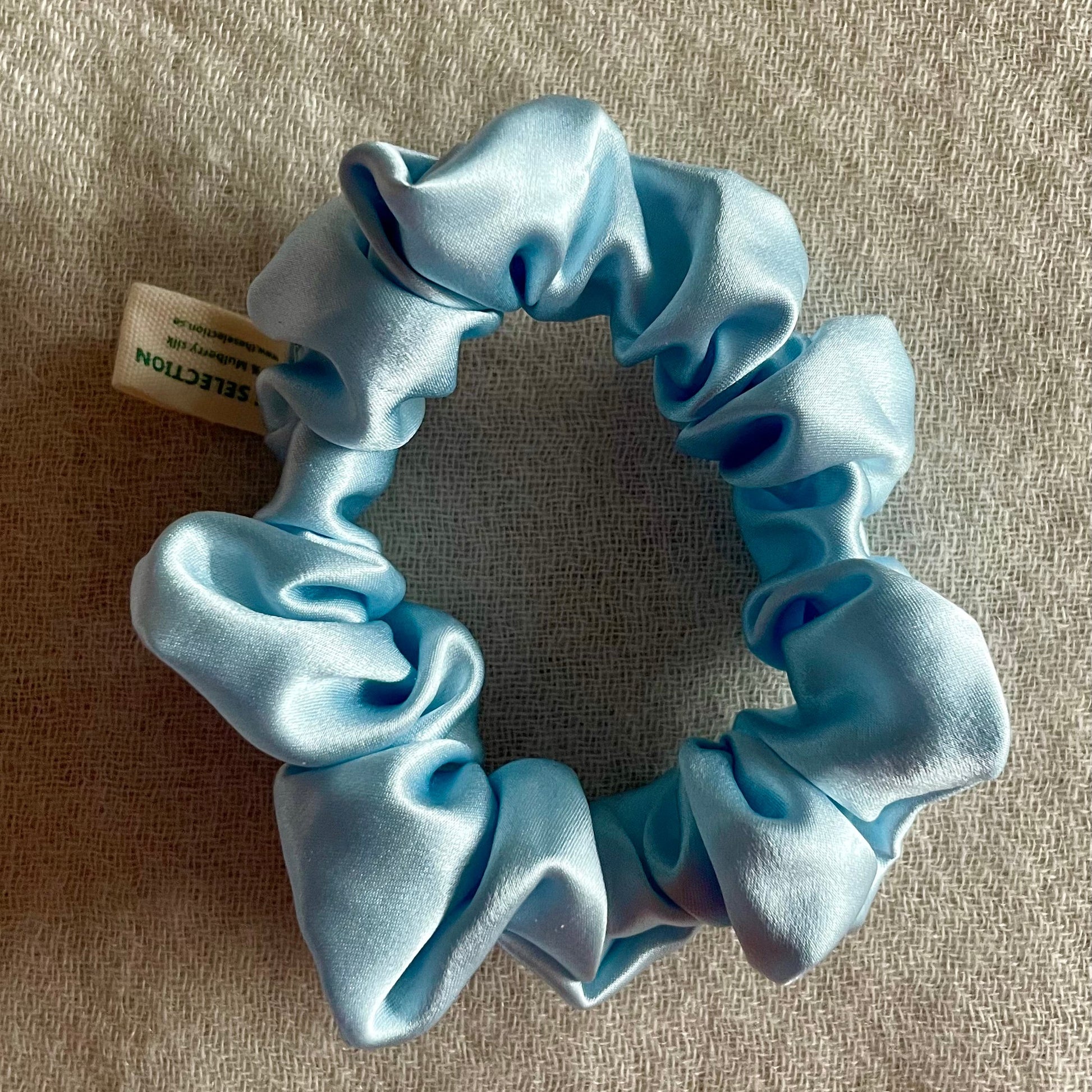 Pure mulberry silk scrunchie in 30 momme thickness In sky blue  color 